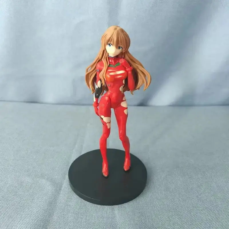 Red plastic pvc figure of ayanami rei in a form-fitting red suit from neon genesis evangelion standing on a base