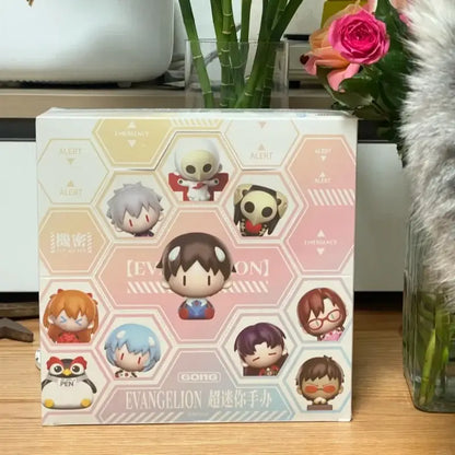 White boxed set of neon genesis evangelion mini figurines in chibi style for magnetic fridge magnet use