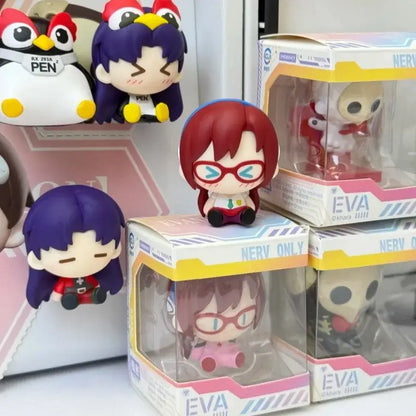 Red-haired anime eva mini figurine with red glasses and pink outfit sitting atop its packaging as a magnetic fridge magnet