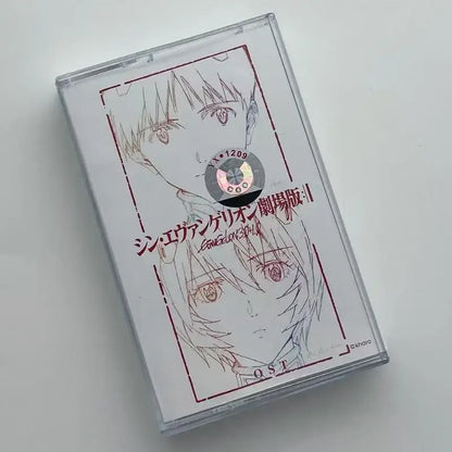 Clear plastic cassette tape case with red anime artwork and silver holographic sticker for neon genesis evangelion ost album