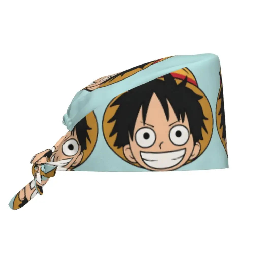 Light blue scrubs cap with a repeating pattern of luffy smiling face from one piece for surgical use