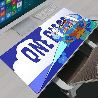 Blue and white one piece logo mouse pad with soft rubber material featuring a cartoon character design for gaming