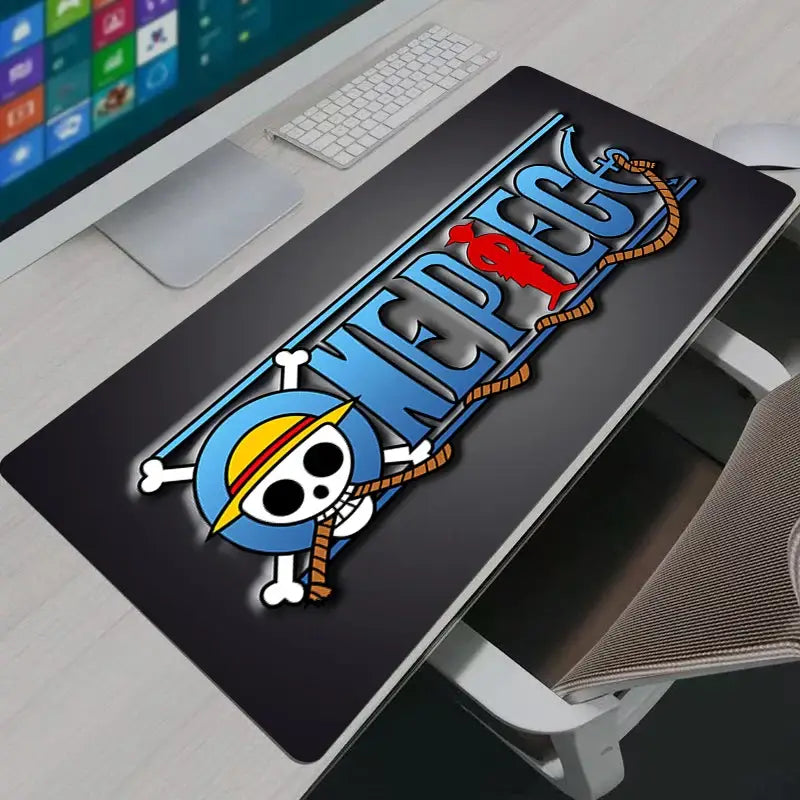 Black one piece logo mouse pad with soft rubber base featuring straw hat pirates blue skull red figure rope details