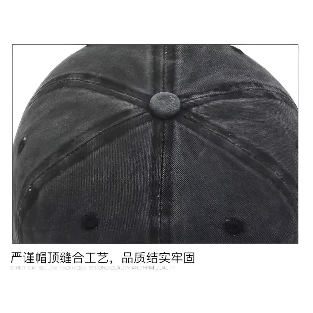 Dark gray denim one piece luffy washed retro baseball cap with matching button and visible stitching