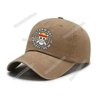 Tan one piece luffy baseball cap with circular embroidered straw hat pirate logo in a washed retro baseball style
