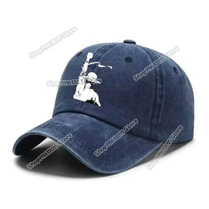 Navy blue denim washed retro baseball cap featuring white graphic of one piece luffy holding a flag