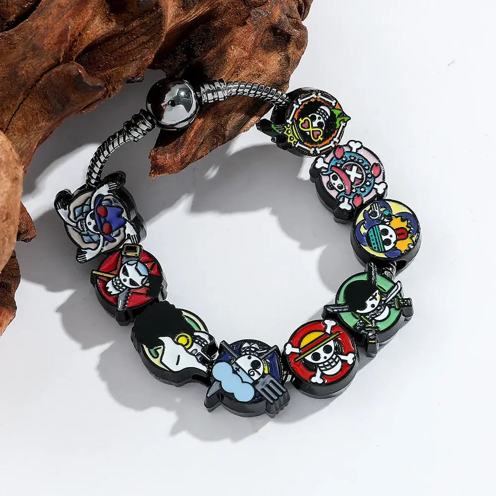 One piece luffy charm bracelet with black beads and colorful enamel pirate-themed diy charms for charm bracelet lovers