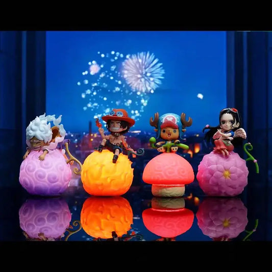 Four colorful glossy one piece figurines posed on illuminated textured mushroom bases in a devil fruit night light