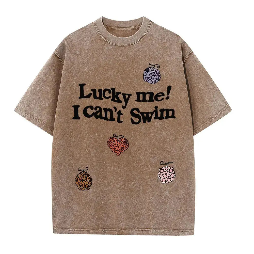 One piece luffy oversized tee in beige washed cotton with bold lucky me i cant swim anime graphic and street style design
