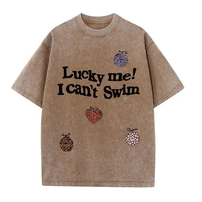 One piece luffy oversized tee in beige washed cotton with bold lucky me i cant swim anime graphic and street style design