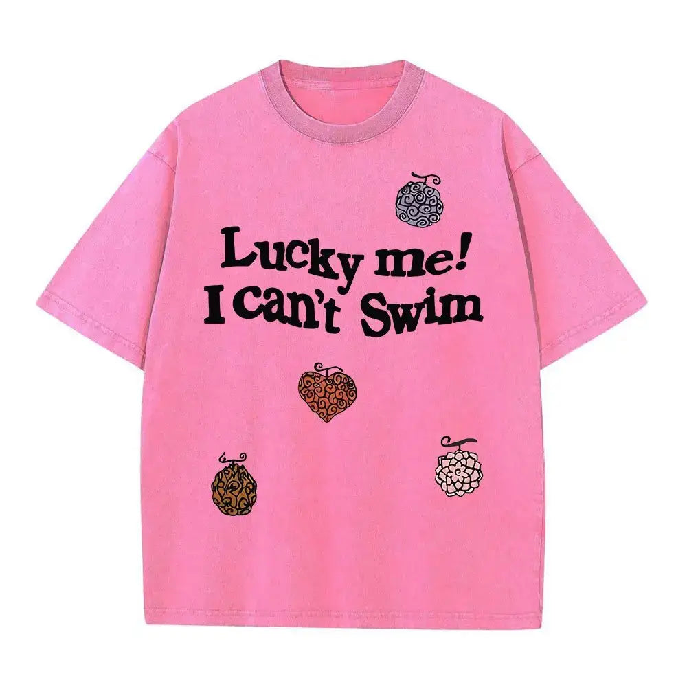 Pink washed cotton one piece luffy oversized tee with bold lucky me i cant swim anime graphic and street style design