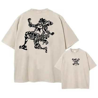 Beige oversized one piece luffy tee in washed cotton with bold black tribal lion back graphic and small chest skull emblem for street style anime graphic fans