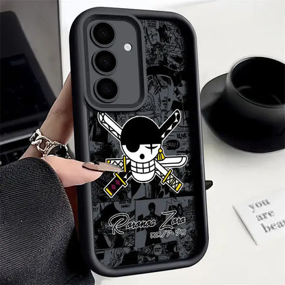 Black soft silicone piece luffy phone case featuring white and yellow one piece jolly roger on back with comic panels background