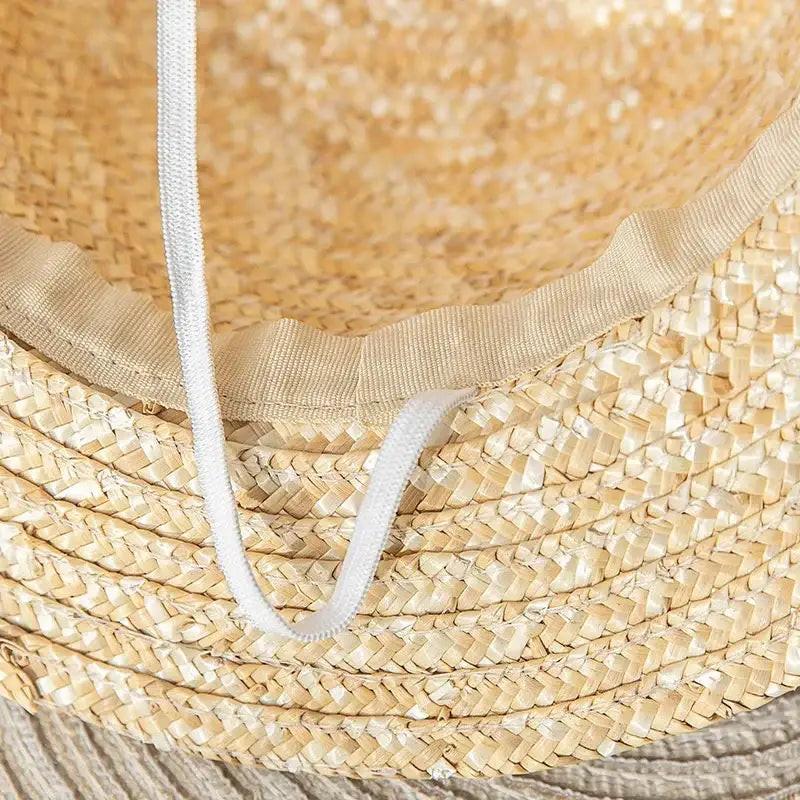 One piece luffy pirate straw hat delivers a natural beige woven straw hat with a white drawstring in 31cm and 35cm sizes