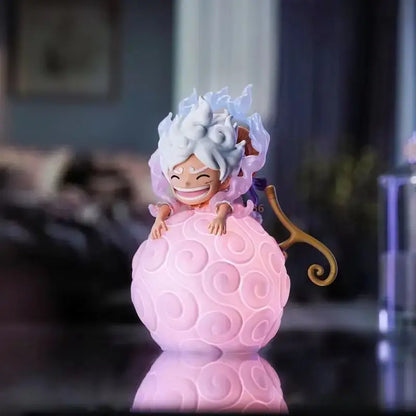 One piece luffy robin ace led lamp featuring a pink textured devil fruit figurine and white-haired character night light