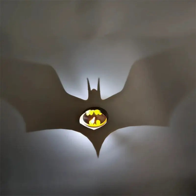 One piece luffy shadow light projector featuring a glowing batman logo light projector casting a yellow bat shadow