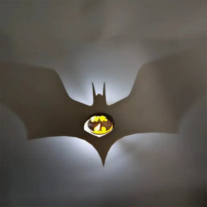 One piece luffy shadow light projector featuring a glowing batman logo light projector casting a yellow bat shadow