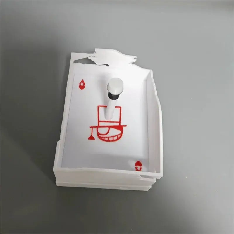 White plastic ashtray shaped like ace of hearts card with central hole, suitable for use with one piece luffy shadow light projector