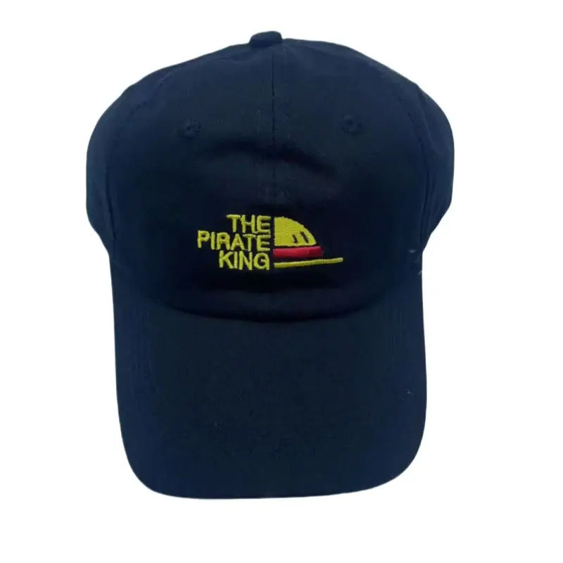 Dark blue flat-brim snapback cap with embroidered the pirate king logo in yellow and red thread from one piece luffy collection