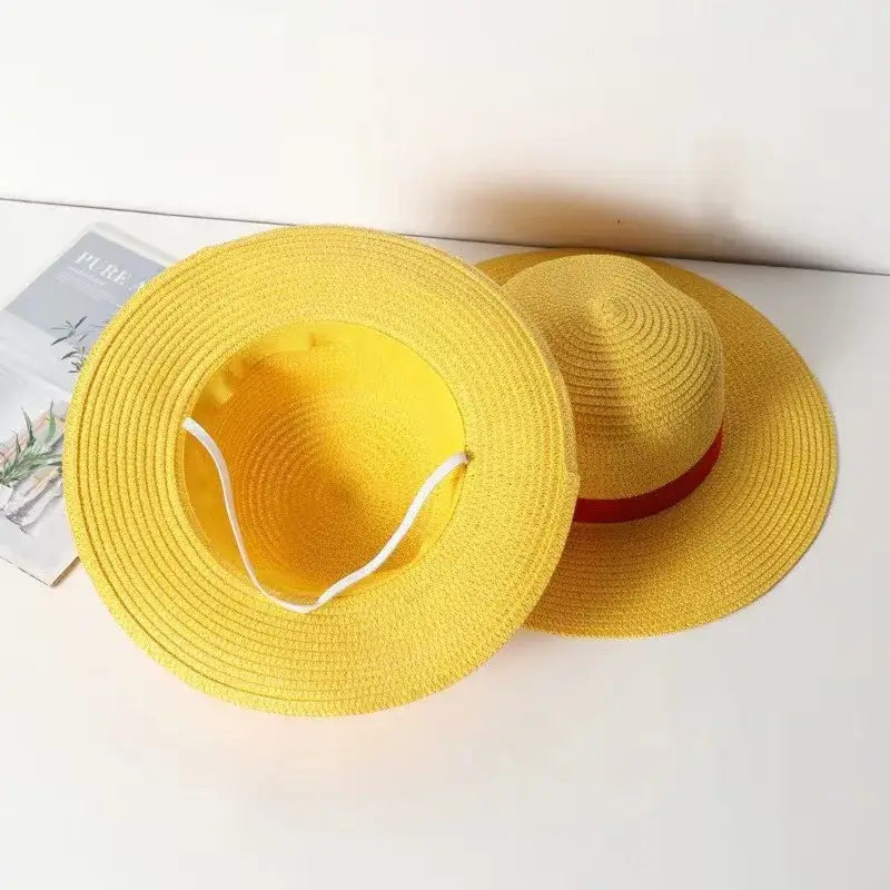 Bright yellow one piece luffy straw hat with red ribbon band and white adjustable strap for kids and adults