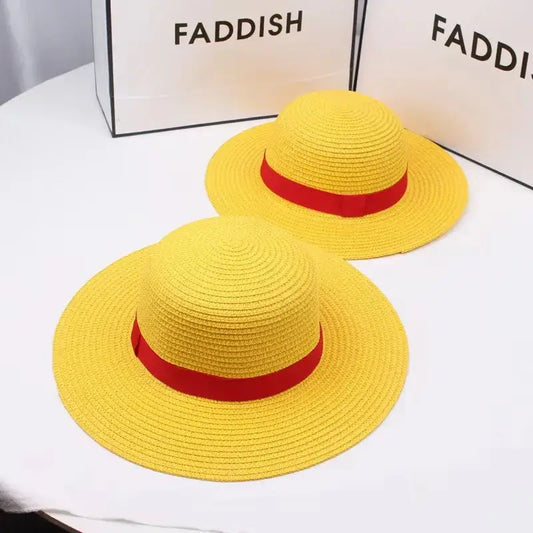Bright yellow straw hat with bold red ribbon band one piece luffy straw hat for kids and adult sizes