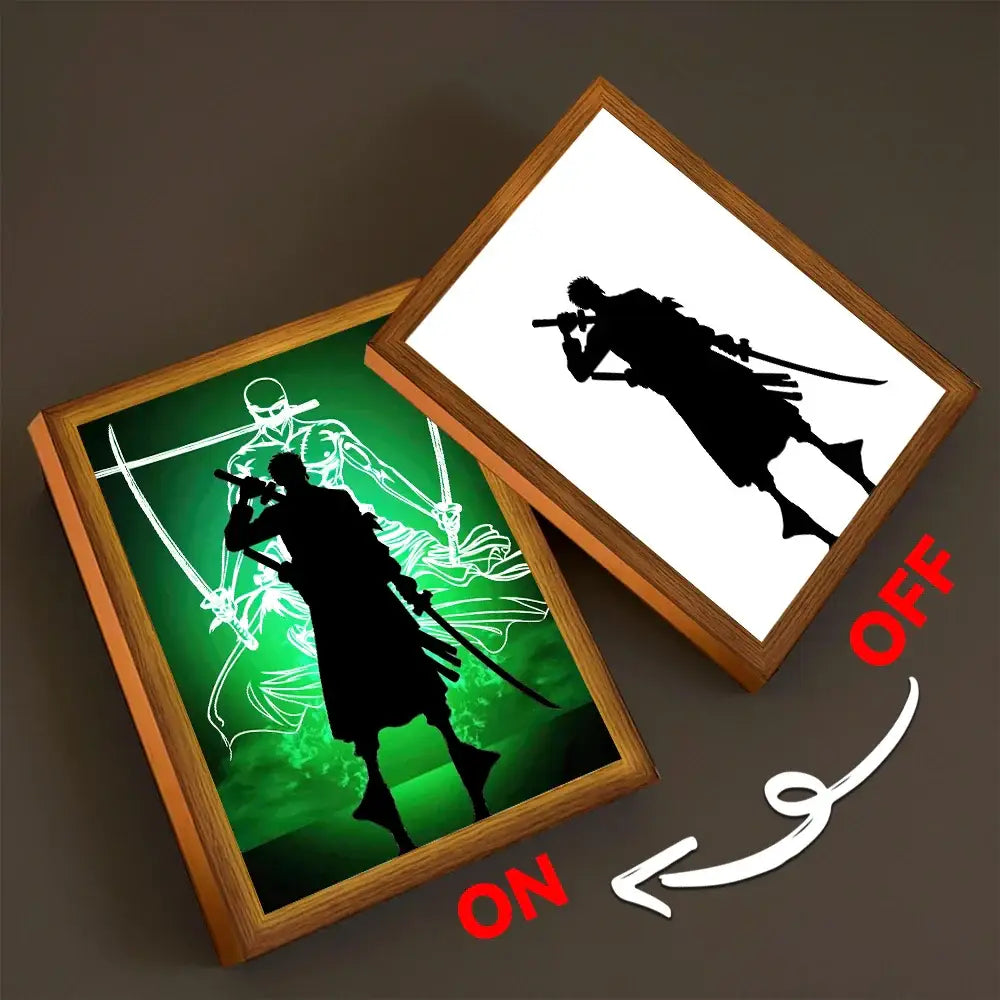 Wood-framed led moon lamp featuring black anime silhouettes of one piece luffy and zoro with glowing green light painting illumination