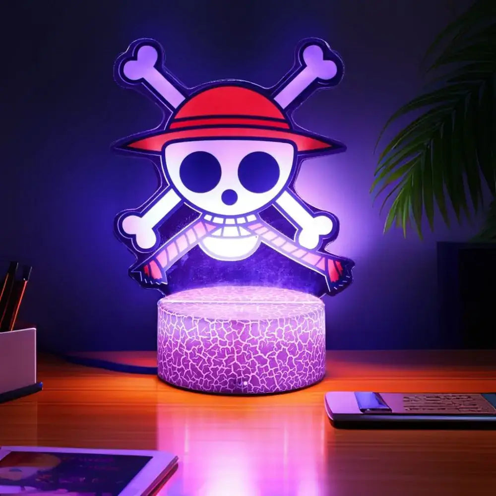 Purple glowing led night light shaped like a cartoon skull with red hat and crackled base piece luffy zoro night light