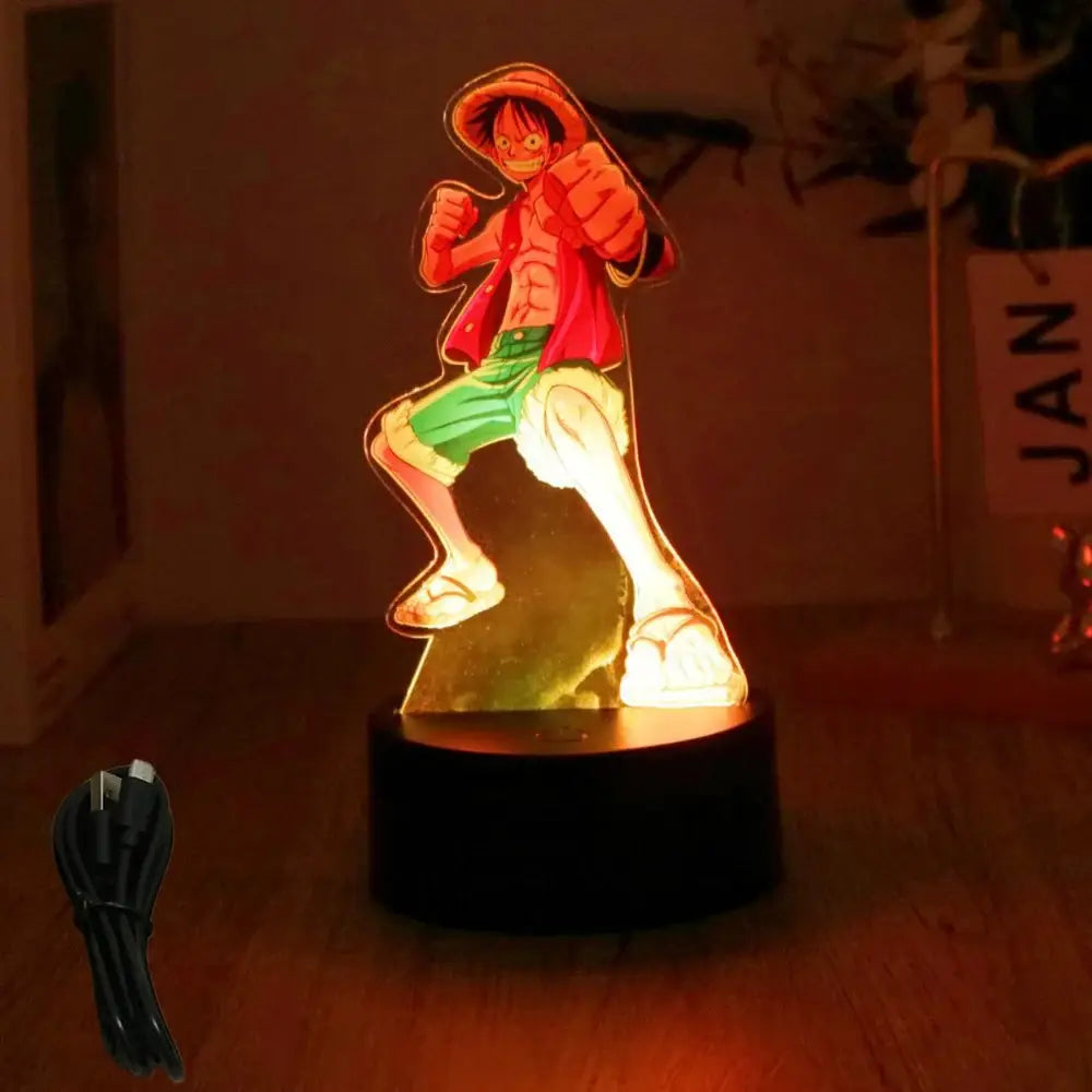 A glowing luffy zoro led night light shaped like a cartoon character in red jacket and green shorts on black base