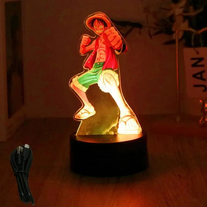 A glowing luffy zoro led night light shaped like a cartoon character in red jacket and green shorts on black base