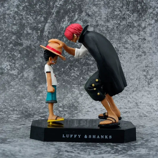 One piece monkey d luffy pvc statue featuring black plastic luffy with straw hat and shanks with red hair and black coat