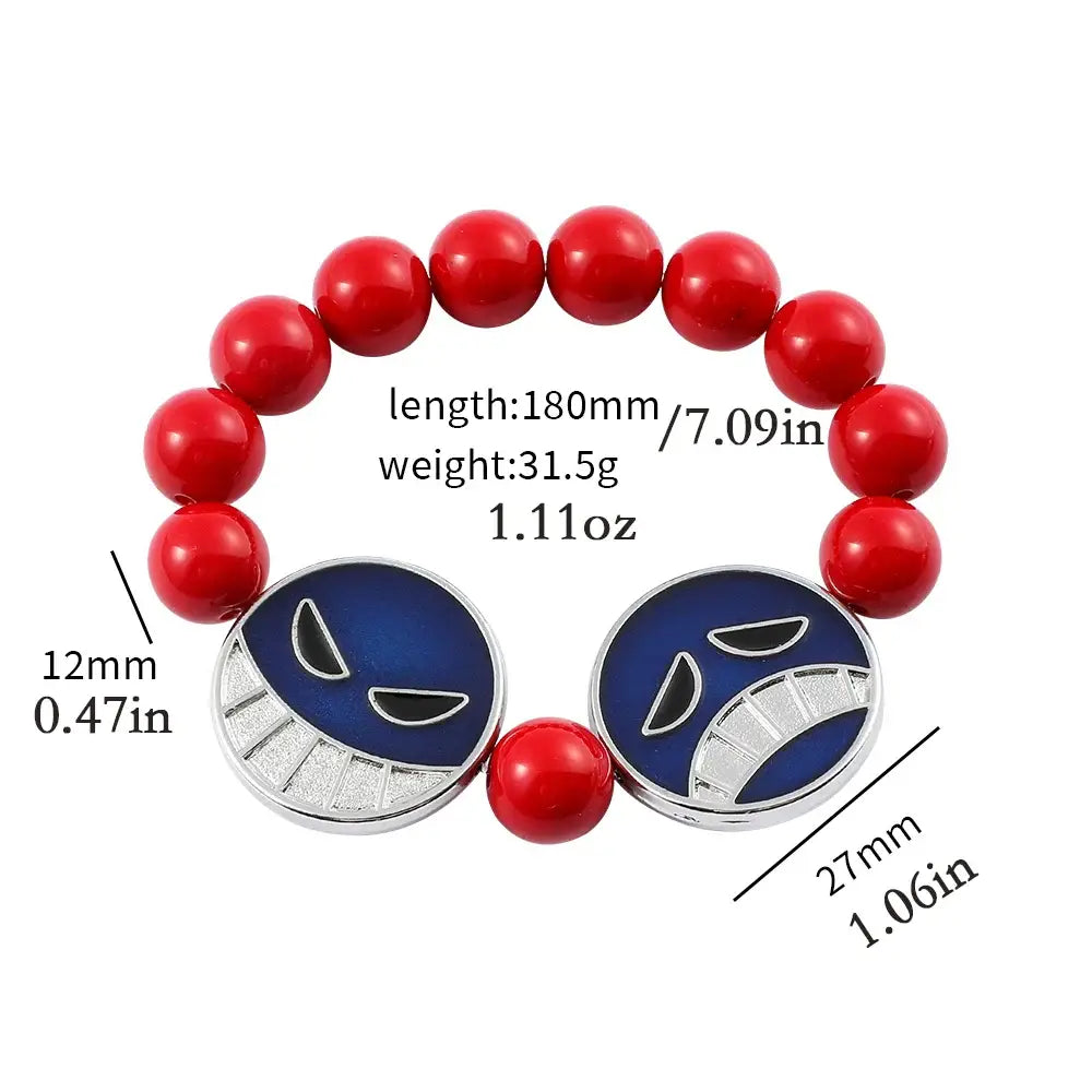Red beads bracelet featuring two blue enamel charms with silver smiling faces from One Piece Portgas D Ace anime jewelry