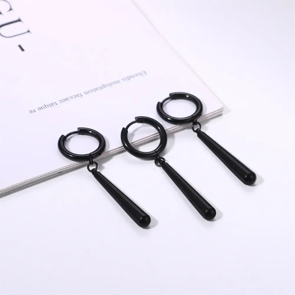 Black stainless steel hoop earrings with sleek teardrop-shaped dangle charms inspired by roronoa zoro