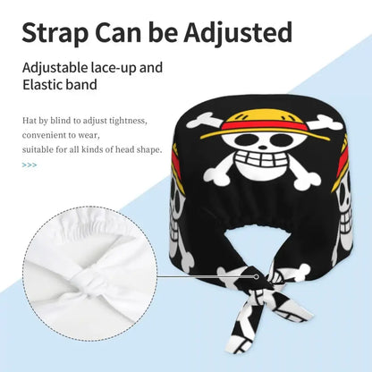 Black fabric piece scrub cap with white skull and crossbones featuring yellow and red accents for medical use