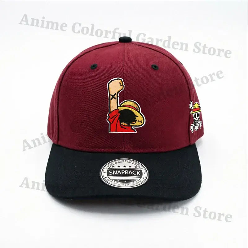 Maroon and black embroidered cotton baseball cap with raised fist luffy patch and jolly roger emblem