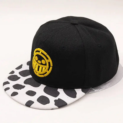 Black snapback one piece tony tony chopper baseball cap with yellow skull logo and white brim with black cow print