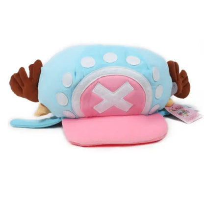 A tony chopper plush hat featuring light blue fabric with white polka dots and pink reindeer antler cap accents