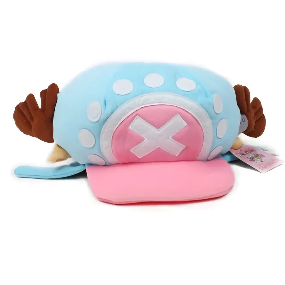 One piece tony chopper plush hat with light blue and pink fabric, white polka dots, brown antler ears, and pink emblem