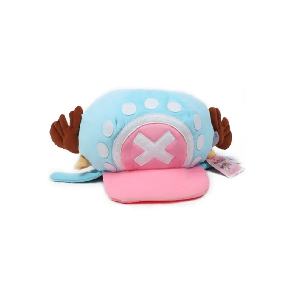 Light blue plush tony chopper plush hat with white polka dots pink x emblem and brown reindeer antler cap