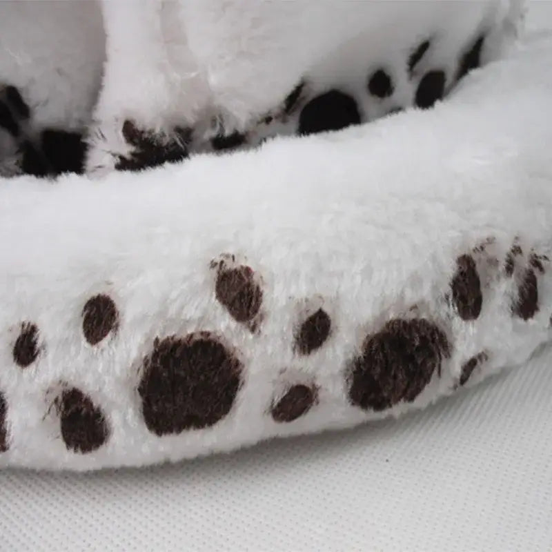 White plush pet bed with brown paw prints featured with one piece trafalgar law cosplay hat design