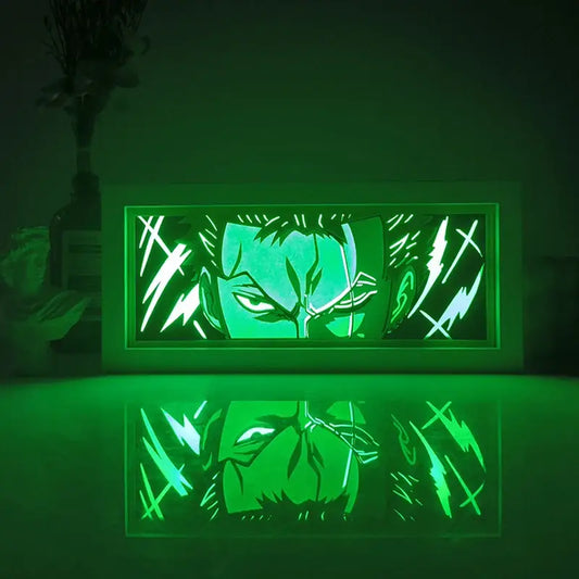 Green-lit rectangular led shadow box light featuring a stylized anime character face with lightning bolt accents from one piece zoro