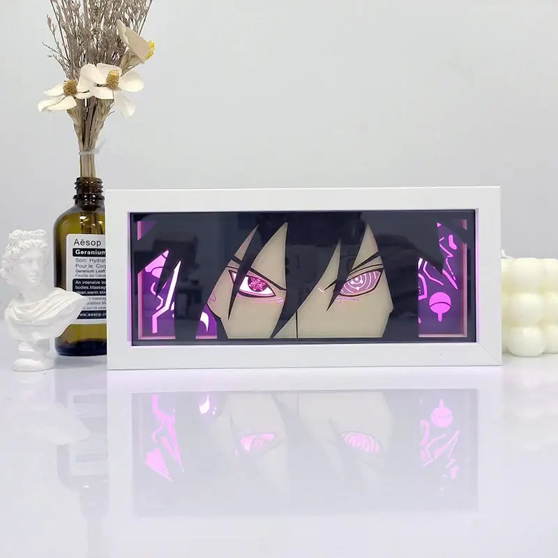White-framed one piece zoro paper cut shadow box light with glowing purple eyes and pink neon accents box light