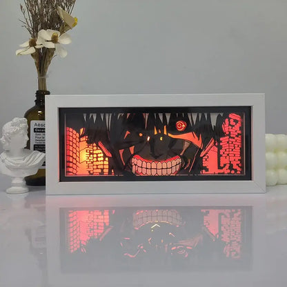 One piece zoro paper cut shadow box light with white frame illuminated by led featuring glowing orange eyes shadow box light
