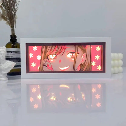 White rectangular led shadow box light featuring illuminated anime girl with glowing red eyes and pink star background