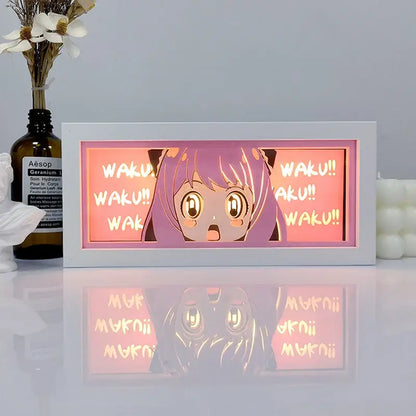 One piece zoro paper cut shadow box light with white frame and illuminated purple-haired anime character and pink waku box light