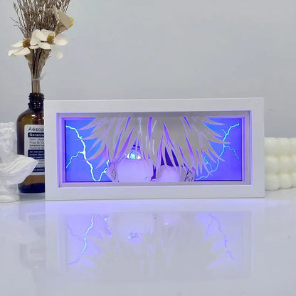 White-framed one piece zoro paper cut shadow box light with silver hair and glowing blue eye in purple lightning backdrop