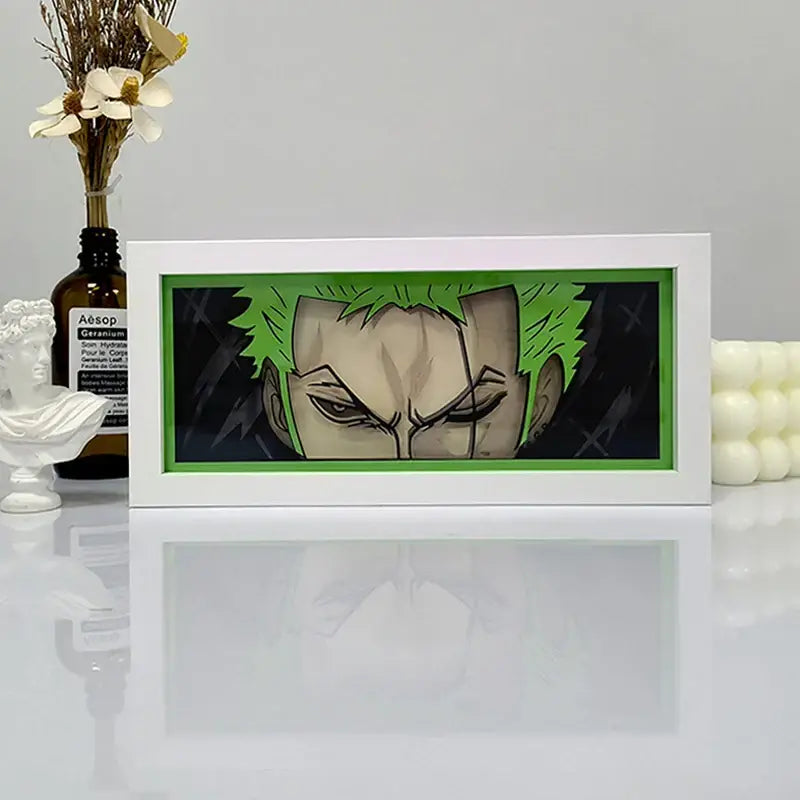 White-framed one piece zoro paper cut shadow box light with green-haired anime character and led remote control box light