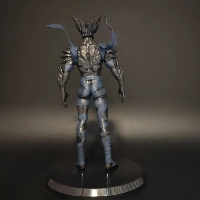 Silver and blue armored punch man hungry wolf desktop figure with spiky shoulder plates and wing-like extensions in pvc