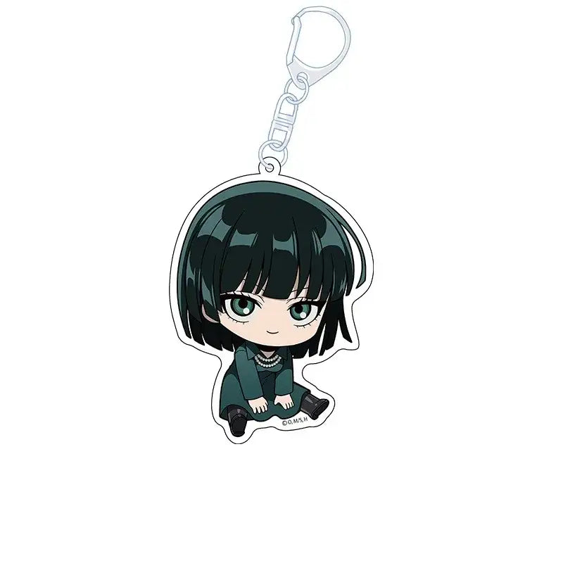 One punch man king acrylic keychain featuring a chibi charm with dark green hair and teal dress design