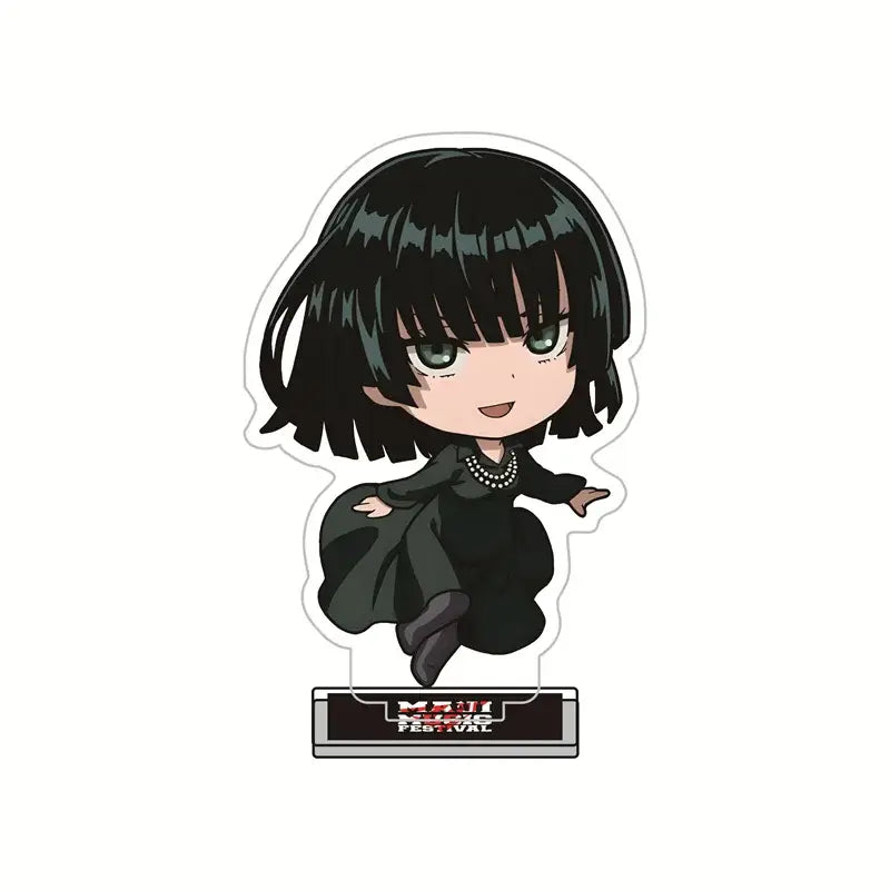 Black chibi-style acrylic stand of king from punch man with short black hair green eyes long black dress and pearl necklace