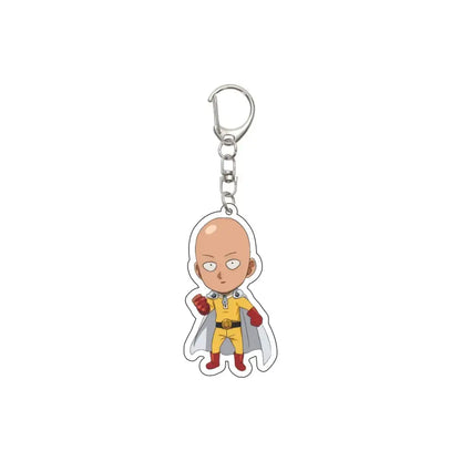 A clear acrylic one punch man saitama keychain featuring the character in his yellow suit on a 55mm plate